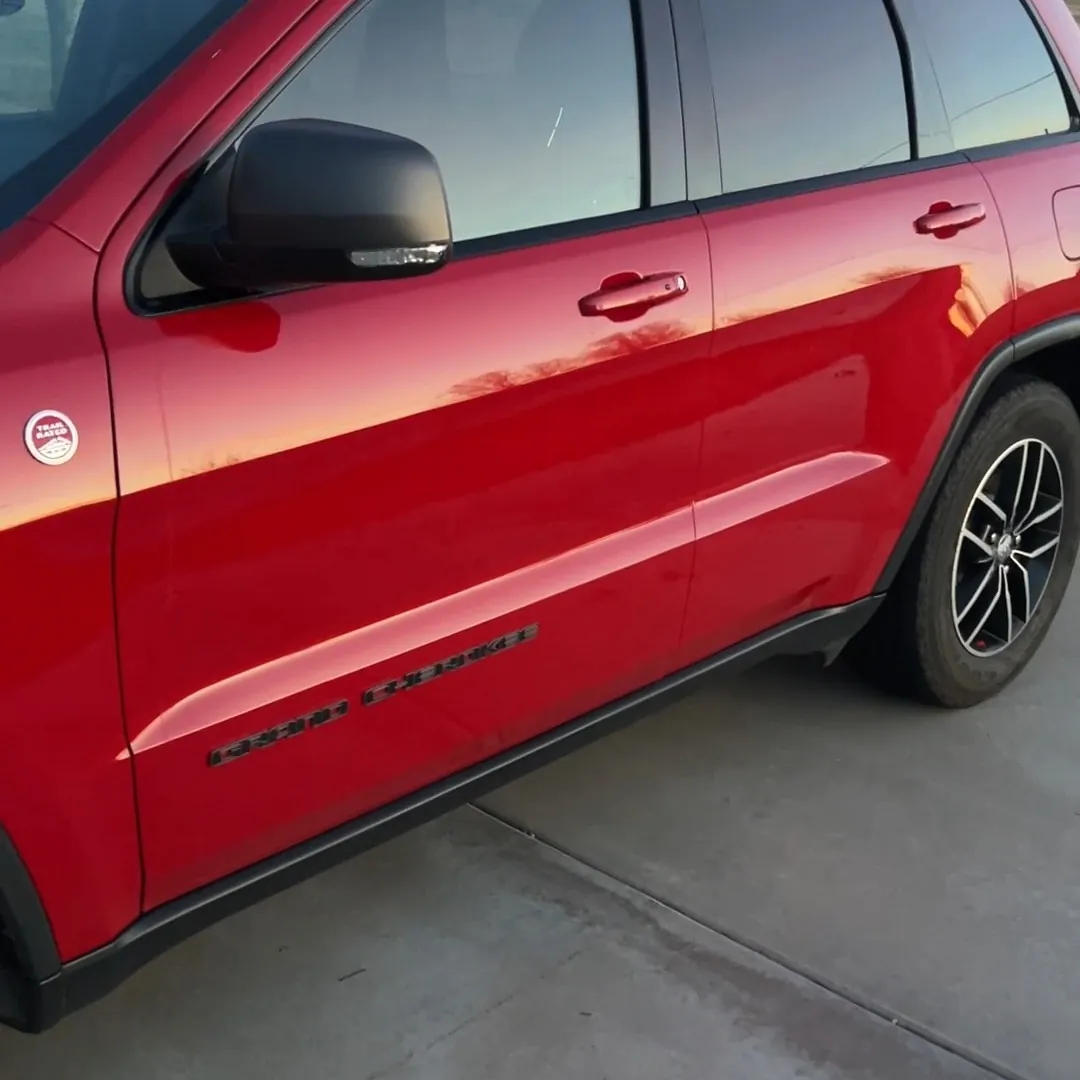 Clean red Grand Cherokee after exterior detailing at Amarillo sunset